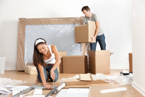 Local removals team preparing a move in Ealing residential street
