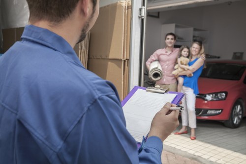 Loading furniture into a moving truck for an Ealing move