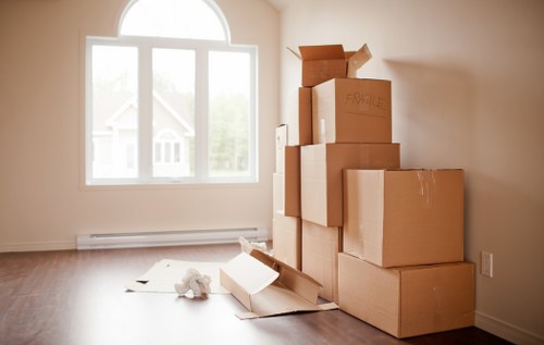 Movers preparing equipment before a house removal