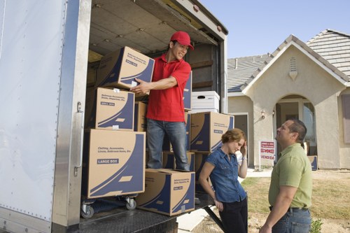 Packed boxes and furniture prepared for urgent removals