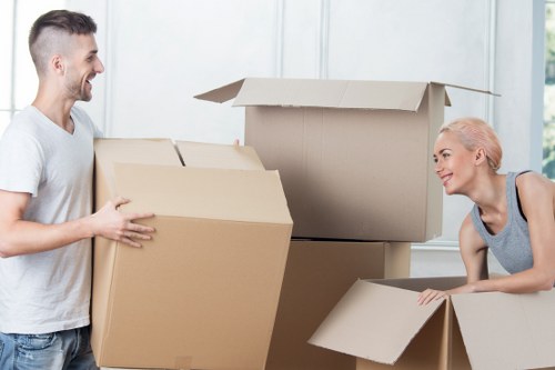 A local removals team handling a flat move with care