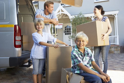 Unpacking boxes into a new Ealing home after relocation