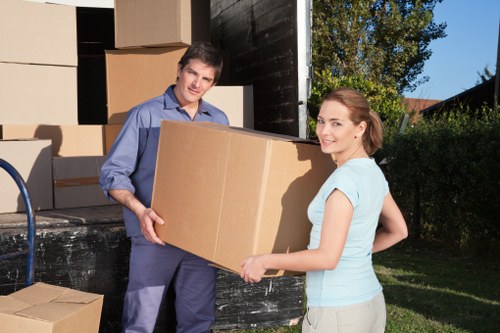 Packed boxes and furniture secured inside a removals truck